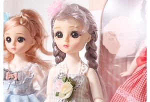 Detail of 1/6 fashion dolls featuring blonde curls and lavender pigtails in lace dresses