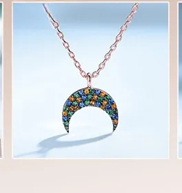 Detailed close-up of S925 silver crescent pendant with colorful cubic zirconia stones