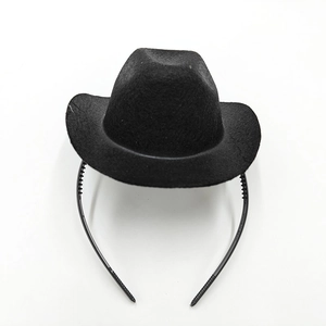 Top-down view of a black mini felt cowboy hat headband for party and event decor