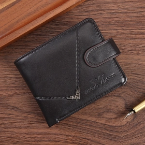 Business men's black leather bifold wallet with buckle on dark wood background