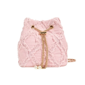 Pink denim drawstring bucket bag with quilted pattern, gold chain and pearl strap