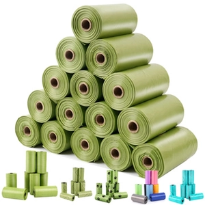 Pyramid stack of biodegradable pet waste bag rolls in assorted vibrant colors