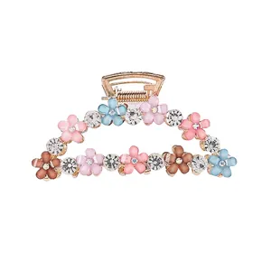 Large alloy hair claw clip with colorful floral enamel and sparkling rhinestones