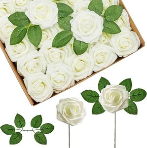 Detail of cream PE foam roses with stems and green leaves in a kraft paper box