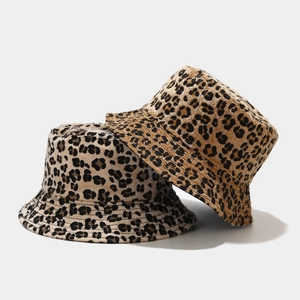 Detailed stitching on leopard print bucket hats in cream and brown winter fabrics