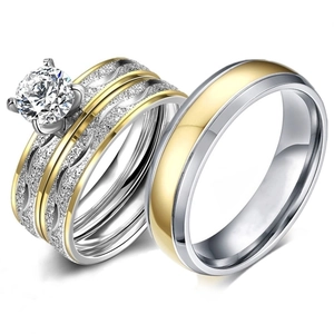 Three-piece ring set featuring round crystal solitaire and two-tone frosted finish bands