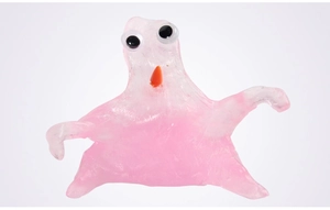 Detail showing a pink translucent slime figure with large plastic eyes and an orange nose