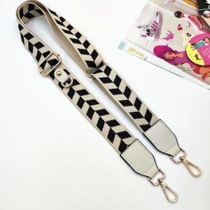 Adjustable wide replacement strap with black and white chevron pattern and gold hardware