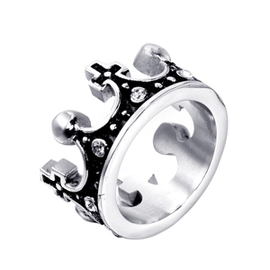 Close-up of silver crown ring with black inlay and sparkling rhinestones on band