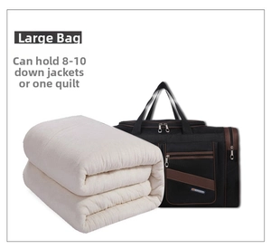 Large travel bag storage capacity shown with a folded quilt for size reference