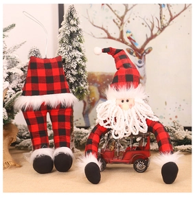 Detail of Christmas plush elf set with red buffalo plaid legs on a vintage toy car