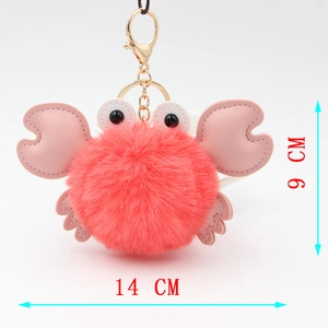 Detailed dimensions of pink plush crab keychain with 14cm width and 9cm height
