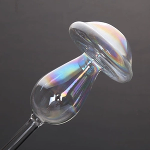 Iridescent mushroom-shaped glass plant self-watering device with a rainbow finish