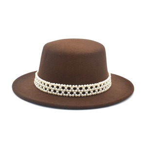 Detail of brown wool fedora with triple-row pearl decorative band and flat top