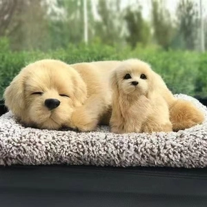 Realistic golden retriever puppy plush toys resting on a grey fuzzy mat outdoors