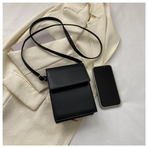 Black minimalist rectangular crossbody phone bag displayed with smartphone for size reference