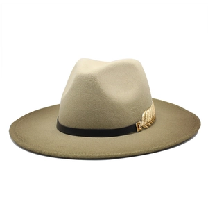 Classic two-tone wool fedora hat with beige crown, wide khaki brim and metal feather pin