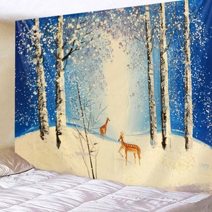 Detailed view of impressionist winter forest landscape tapestry hanging in a cozy bedroom