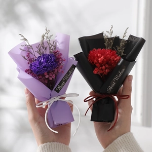 Mini dried flower bouquets with carnations in purple and black wrap for gifts