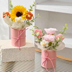 Handmade crochet flower bouquet with sunflower and carnations in a pink gift pot