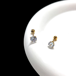 Detailed view of 14K gold-plated screw-back stud earrings with sparkling cubic zirconia
