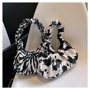 Cloud shoulder bag featuring zebra and cow animal prints with trendy scrunchie straps