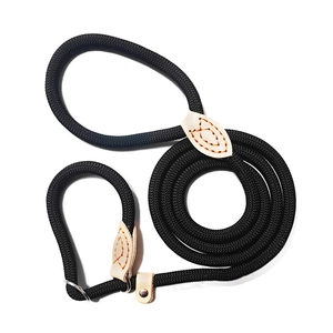 Detail of heavy-duty black braided nylon P-chain leash with reinforced leather stitching