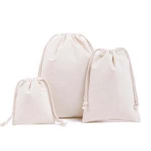Three-piece set of cream white cotton drawstring bags in small medium large sizes