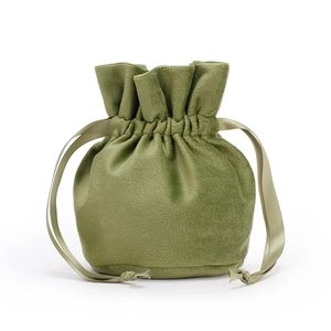 Grass green round bottom velvet drawstring pouch with silky ribbons for jewelry storage
