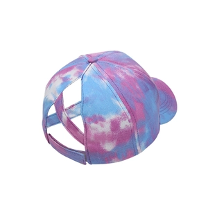 Tie-dye ponytail baseball cap with criss-cross elastic bands in lavender and sky blue
