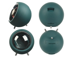 Detailed views of a spherical dark green watch winder with metallic tripod legs from various angles