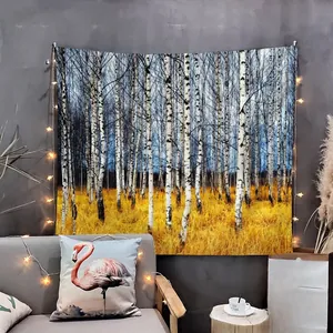 Cozy room detail featuring a birch forest landscape tapestry with twinkling fairy lights