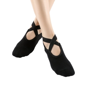 Non-slip cotton yoga socks with cross straps and backless design in black color