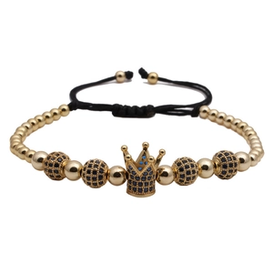 Detail of adjustable crown beaded bracelet with blue crystals and gold-plated beads