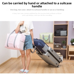 Close-up of the suitcase trolley sleeve on the back of the foldable travel bag