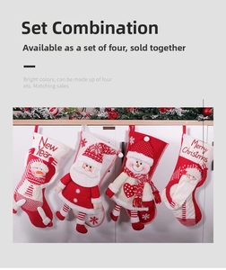 Close-up of four red and white 3D Christmas stockings with plush Santa and Snowman