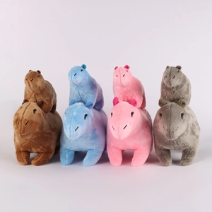 Collection of brown, blue, pink, and grey Capybara plush toys in two sizes on white background
