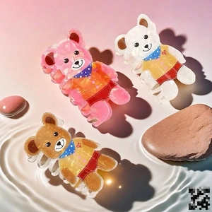 Cartoon bear hair claws in pink white and brown colors with polka dot scarves