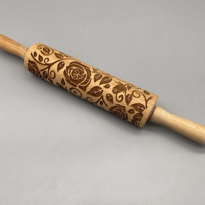 Wooden rolling pin with laser-engraved floral patterns for Christmas cookie baking