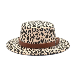 Detail of leopard print felt hat featuring a flat top and decorative brown leather band