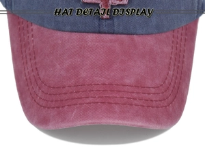 Close-up of washed cotton baseball cap brim with multi-row stitching and contrast colors
