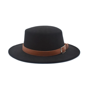 Close-up of a black flat top boater hat with brown leather belt and metal buckle detail