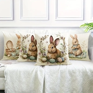Easter throw pillow covers with rabbit and egg prints on a linen sofa cushion set