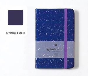 Detail of Mystical purple glitter A5 notebook with rainbow star pattern and elastic band
