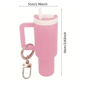 Pink mini tumbler keychain with size dimensions 5x10cm showing white cap and straw