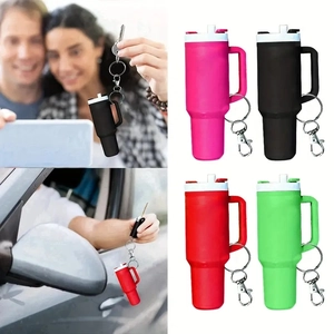 Colorful silicone cup keychain holders in rose, black, red and green for backpacks