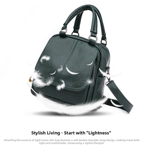 Close-up of lightweight dark green pebble faux leather backpack with feathers on white background