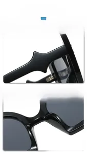 Detail of robust hinges and comfortable integrated nose pads on black cat-eye sunglasses