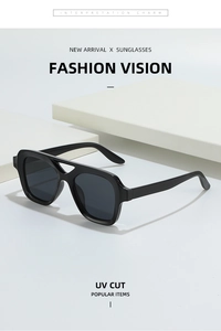 Detail of square black sunglasses with dual beam bridge and UV protection lenses