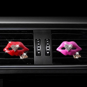 Red and pink lip-shaped car air vent aromatherapy clips with heart rhinestones and KISS pendant